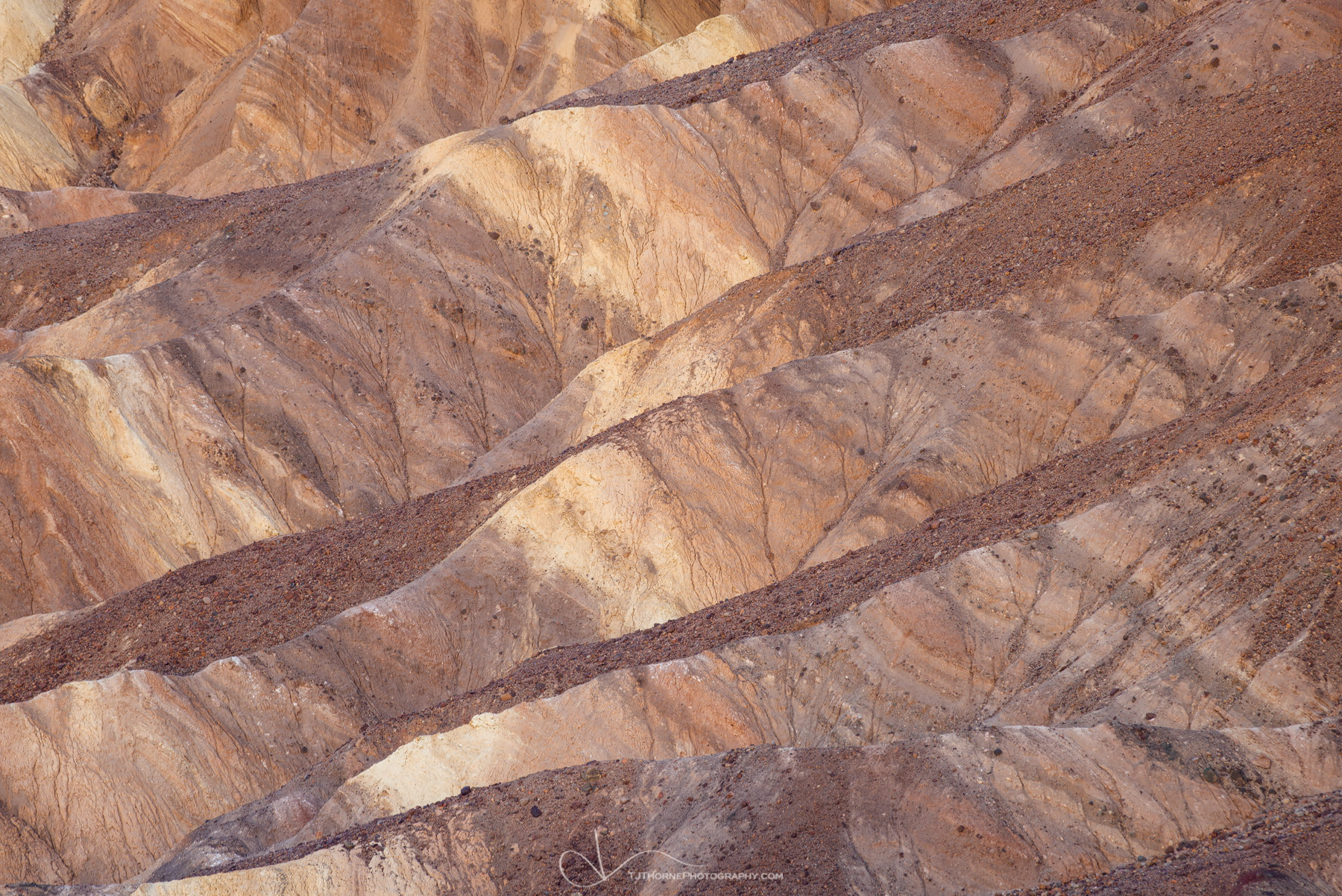 An abstract of variegated badlands in Death Valley National Park.