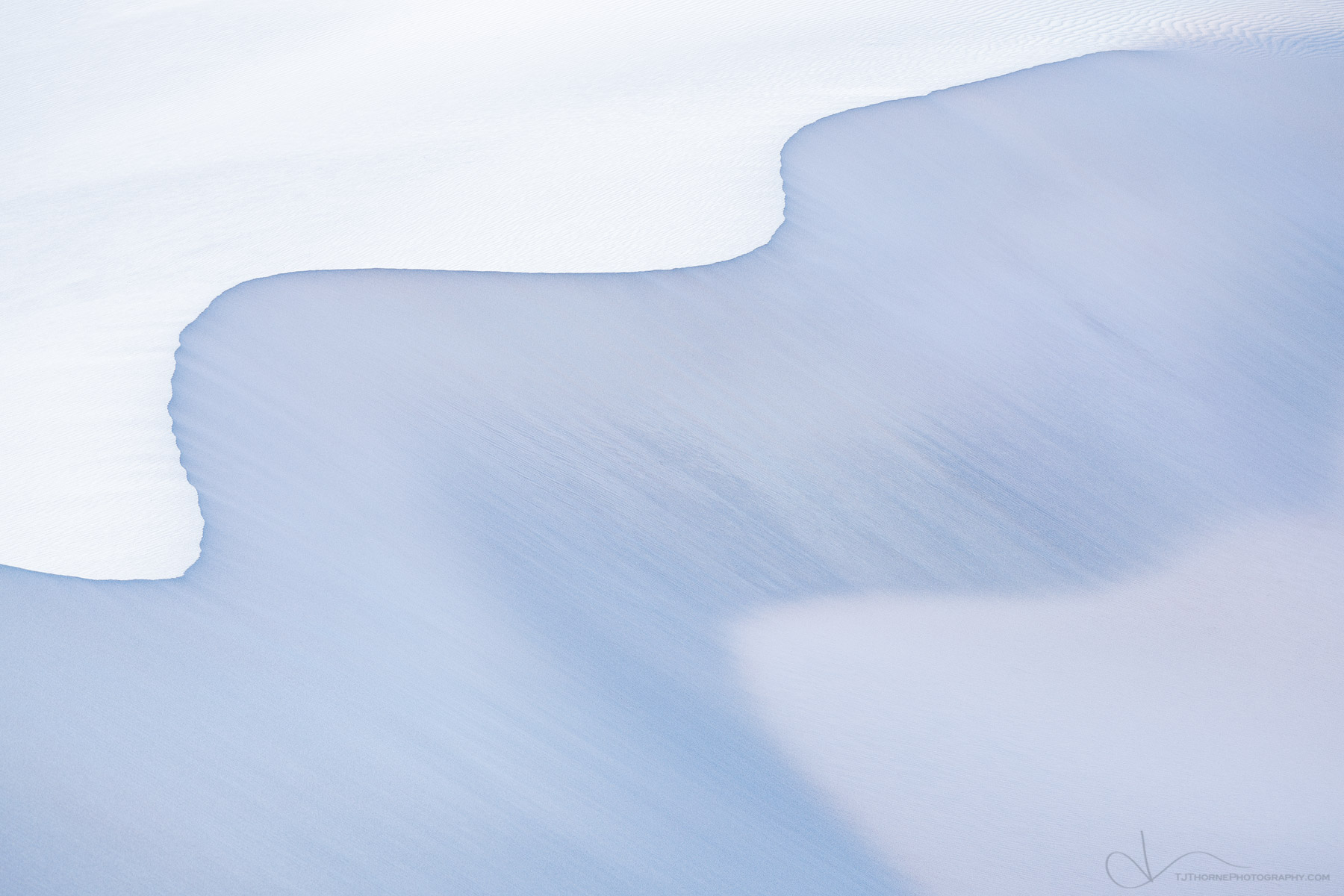 An abstract of gentle curves in the sand dunes of Death Valley National Park.