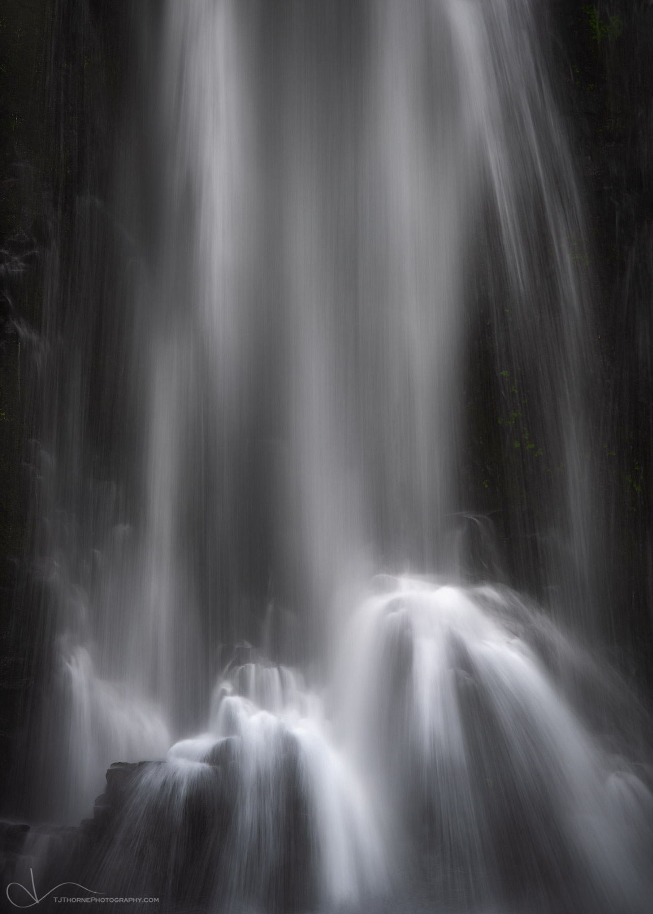 An intimate view of the crashing water of Double Falls at Silver Falls State Park, Silverton, Oregon.